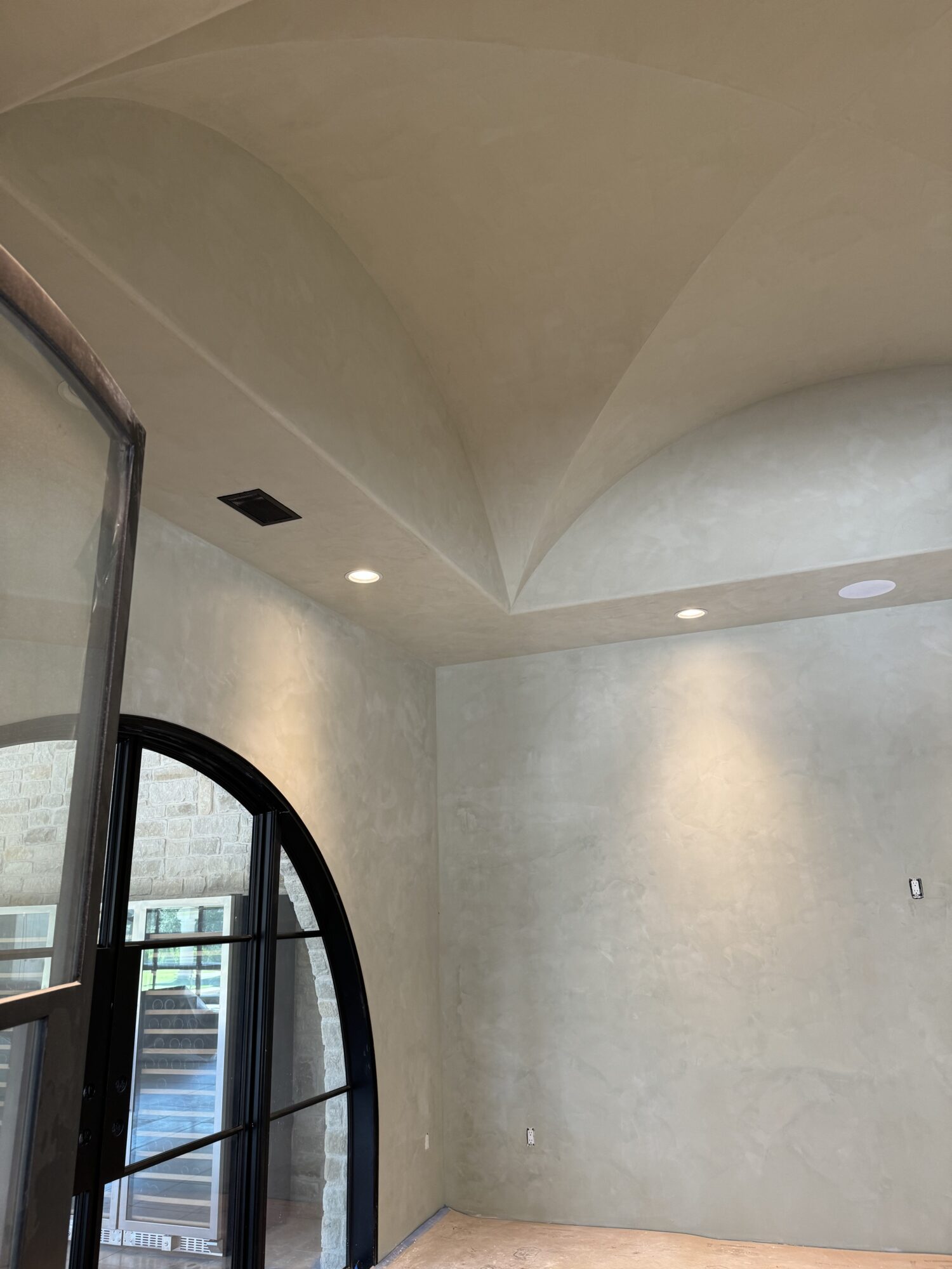 venetian plaster accent wall in modern room